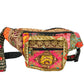Colorful waist bag with intricate patterns on a white background