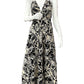 Mannequin wearing a black and white patterned dress on a white background