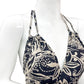Close-up of paisley print on black and cream halter maxi dress, soft rayon fabric