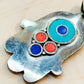 Turquoise & Coral Hamsa Pendant – Handmade Tibetan Amulet from Nepal