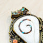 Sacred Conch Shell Pendant with Turquoise & Coral Inlay – Handmade Brass Amulet from Nepal