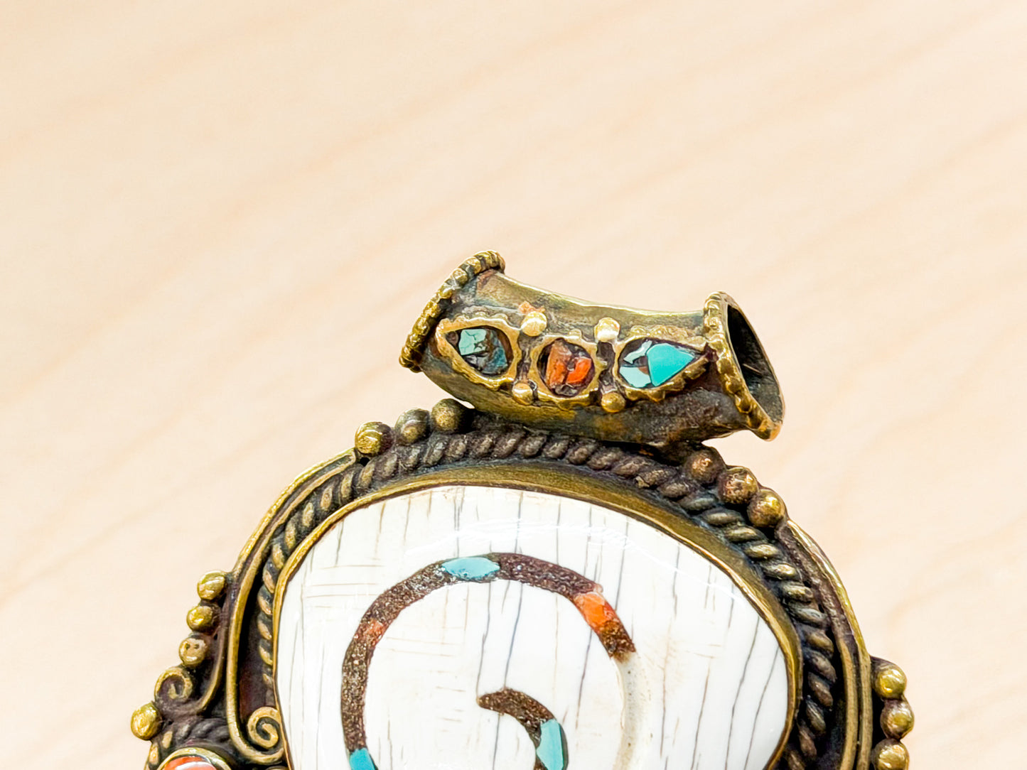 Sacred Conch Shell Pendant with Turquoise & Coral Inlay – Handmade Brass Amulet from Nepal